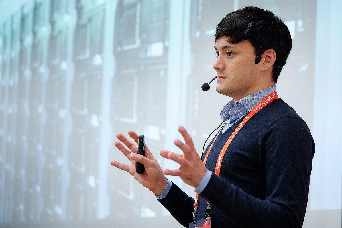 One of Screenly's developers announcing digital signage product updates to an audience.