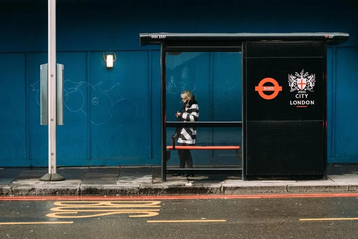 A digital sign in an outdoor bus shelter, one of the placements outdoor digital signage hardware is built for.