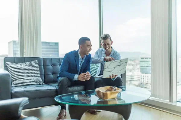 An image of happy customers served by customer success team that uses digital signs.