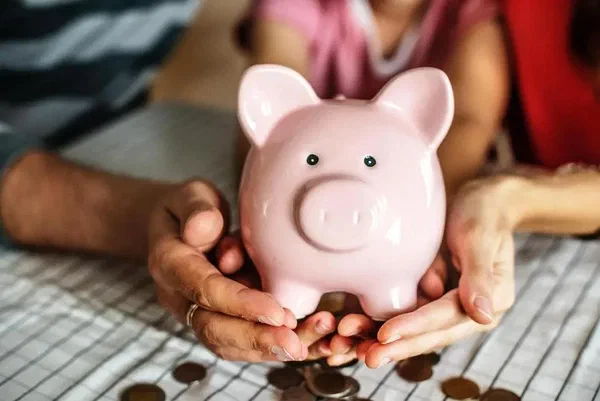 This image is of a piggy bank where people save money from their free digital signage software.
