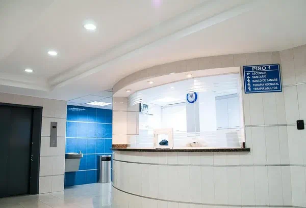 A picture of an empty medical office waiting room that needs a digital sign.