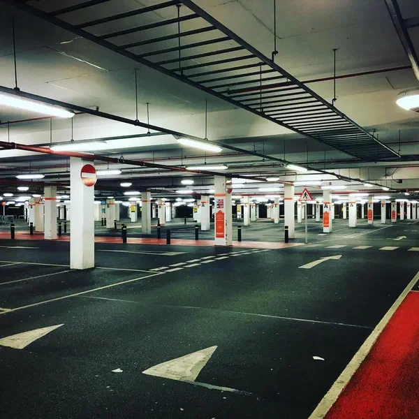 An indoor parking lot facility.