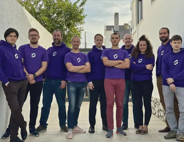 Digital signs on a conference room wall controlled by digital signage content management software.