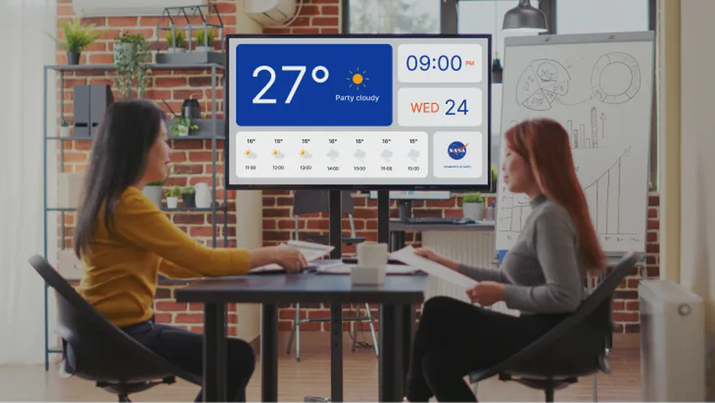 Photo of people using the app in a conference room